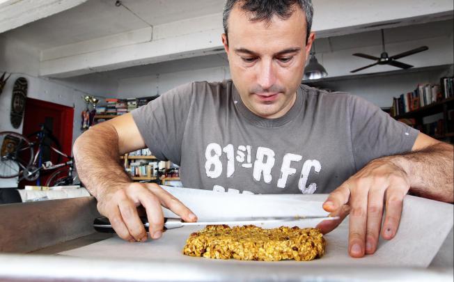 Andrea Oschetti had difficulty finding a healthy energy bar in the shops, so he made his own. Photo: Dickson Lee