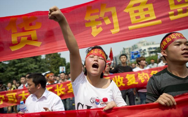 A Chinese demonstrator shouts slogans during a protest against Japan's "nationalising" of Diaoyu Islands, also known as Senkaku in Japan. Photo: AFP