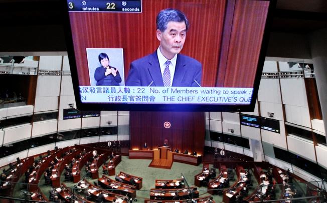 Chief Executive Leung Chun-ying attends a question and answer session regarding the illegal structures at his home in Legislative Council. Photo: Sam Tsang