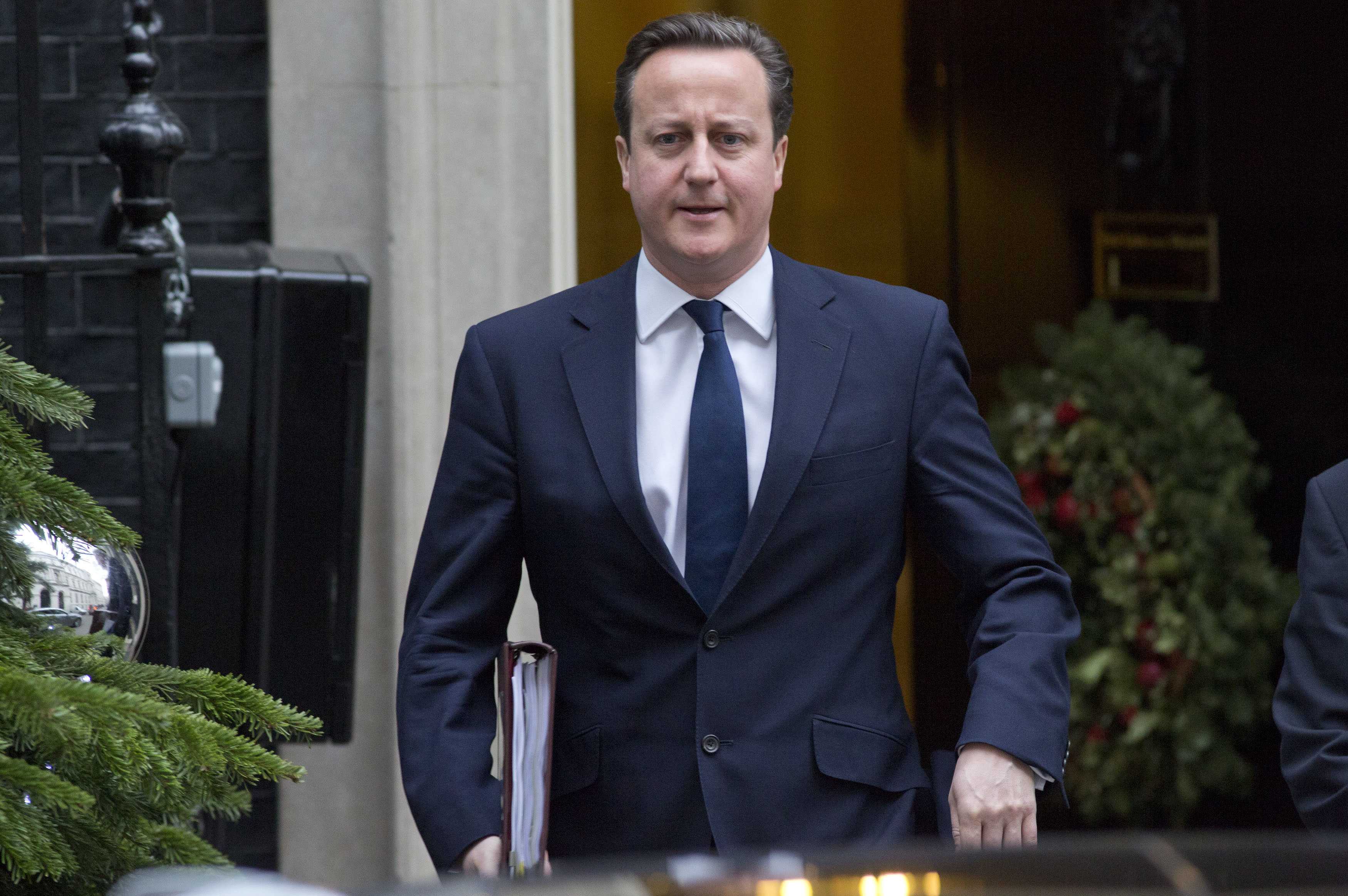 Britain’s Prime Minister David Cameron has been accused of leaving one of his ministers 'swinging in the wind'. Photo: AP