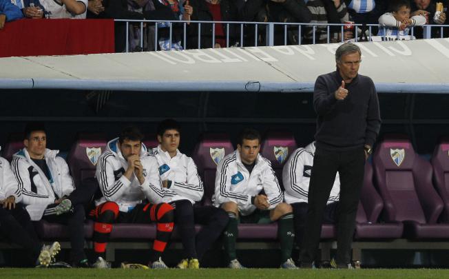 Real Madrid coach Jose Mourinho's (right) decision to to drop goalkeeper and captain Iker Casillas (second from left) from the starting line-up against Barcelona on Saturday has put him under renewed scrutiny. Photo: AP