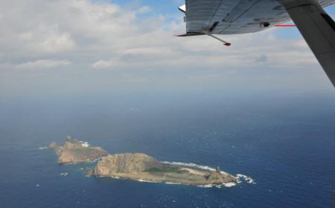 Photo taken on a marine surveillance plane B-3837 on Dec. 13, 2012 shows the Diaoyu Islands and nearby islands. Picture: SCMP Photos/ Xinhua