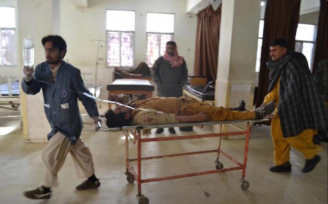 Shia Muslim pilgrims injured in a bomb attack on Sunday are rushed to a local hospital in Quetta, the provincial capital of restive Baluchistan province. Photo: EPA