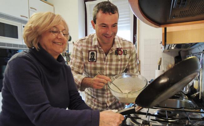 Andrea Oschetti makes crespelle with radicchio at home with his mother Liliana.
