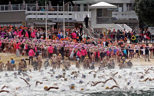 Competitors set the South China Sea churning during the 37th annual swimming race at Repulse Bay yesterday. Photo: Edward Wong