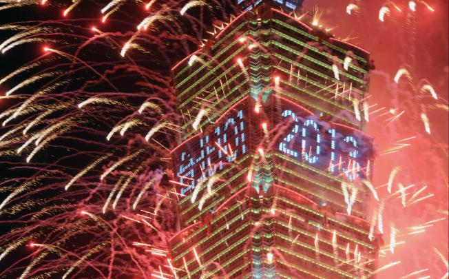Fireworks are launched from the Taipei 101 building to mark the new year. Photo: AFP