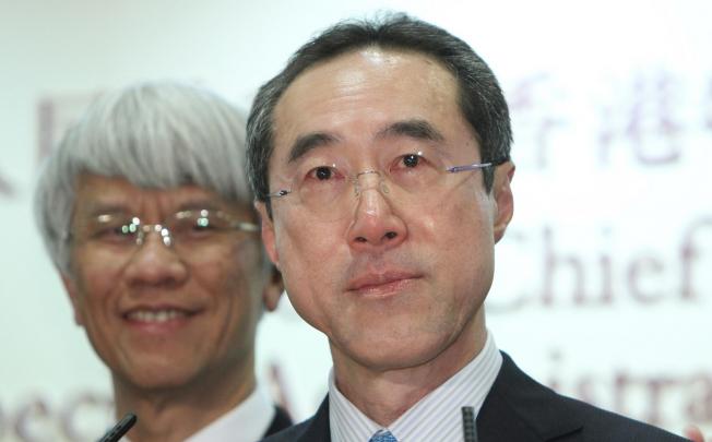 Henry Tang Ying-yen (right)