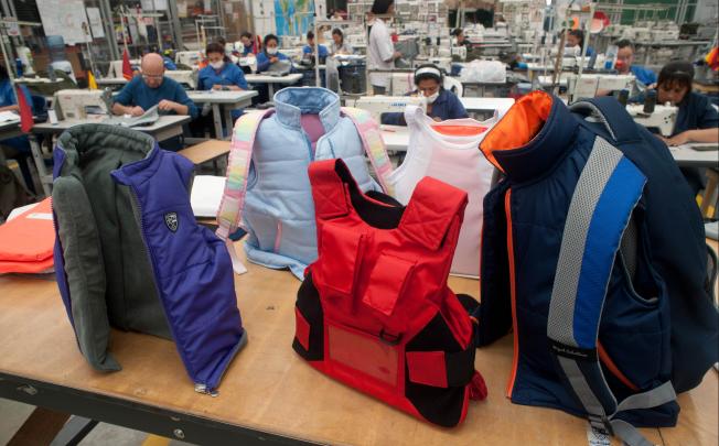 Picture of the new clothing line for children with bulletproof protection taken at the factory of Colombian businessman Miguel Caballero. Photo: AFP