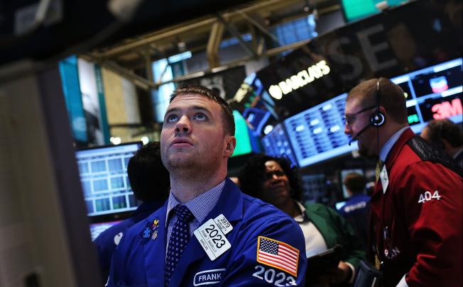 A day after U.S. lawmakers reached a last minute agreement to avert the fiscal cliff, stocks surged as traders around the globe felt renewed confidence over global markets. Photo: AFP
