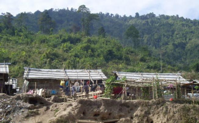 Bomb shelters built by Kachin refugees, at the Je Yang IDP camp, near Laiza, northeastern Myanmar. Photo: AP