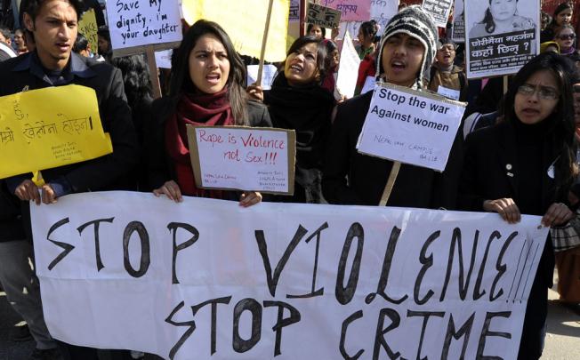 Activists shout anti-rape slogans in Kathmandu. Photo: AFP  