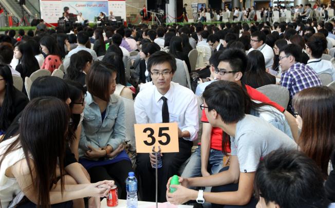 Tertiary education students attend a career forum. Photo: Edward Wong