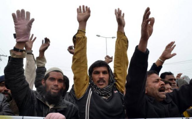 Pakistani demonstrators shout anti-US slogans during a recent protest in Multan against the drone attacks in Pakistan's tribal areas. Photo: AFP