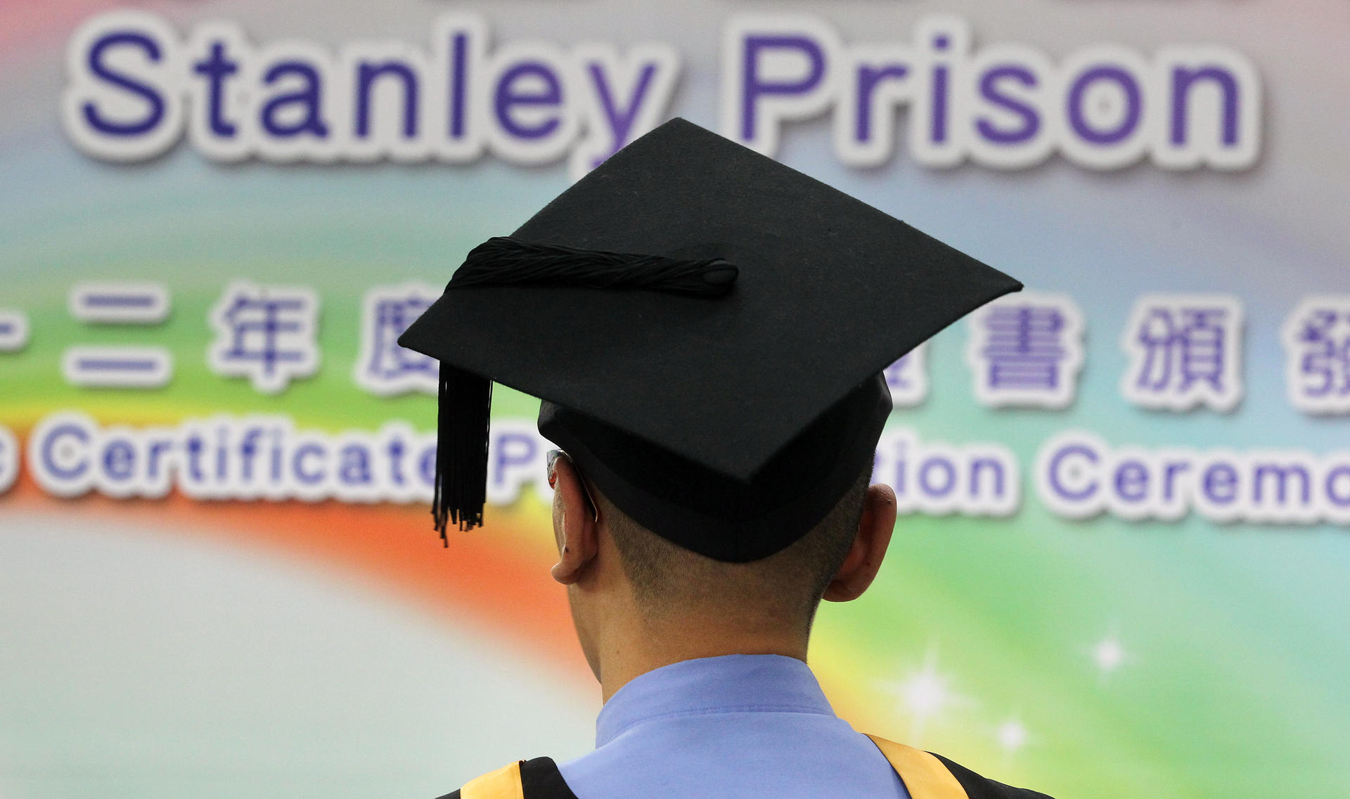 Inmate Kei, 37, received his bachelor’s degree in Stanley Prison yesterday. He was among 97 inmates who were recognised for their academic achievements. Photo: K. Y. Cheng