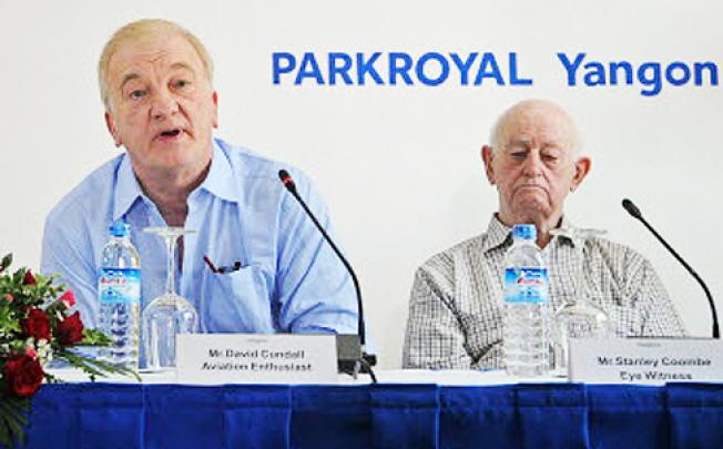 David Cundall (left) speaks at a press conference on a search for buried Spitfire planes in Myanmar on Thursday as Stanley Coombe (right), a 91-year-old former soldier looks on. 