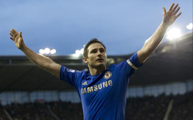 Chelsea's Frank Lampard celebrates after scoring his 194th Chelsea goal, during a match against Stoke City on Saturday. Photo: AP