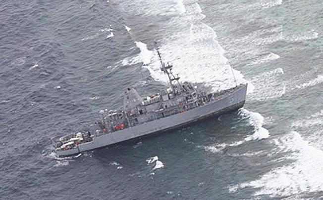 US Navy ship USS Guardian, which ran aground near Tubbataha Reef in the western Philippines. Photo: EPA