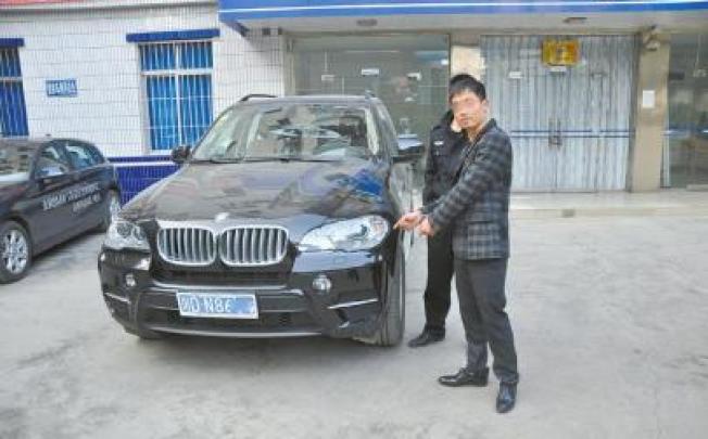 The BMW X5 was deliberately damaged during a test drive. Picture: SCMP/Nandu