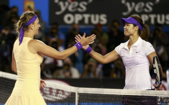 Victoria Azarenka of Belarus (left) with Li Na of China after defeating her in their singles final at the Australian Open tennis tournament on Saturday. Photo: Reuters