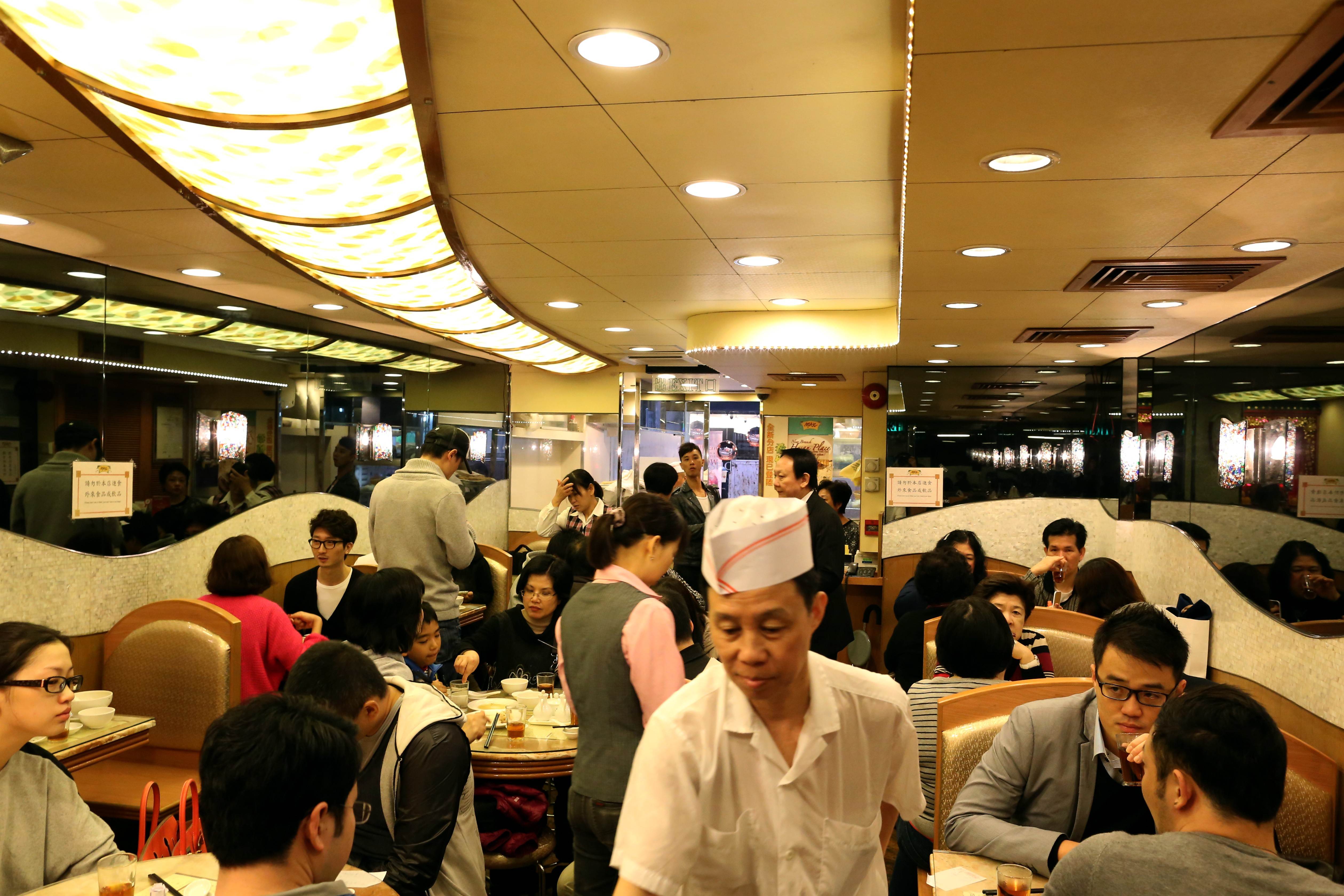 Diners at the one-Michelin-starred restaurant Ho Hung Kee in Hong Kong. Photo: AFP