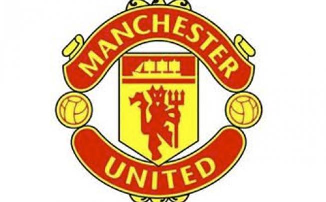 The Manchester United logo. Photo: AP