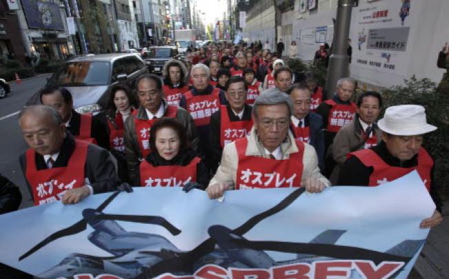 Anti American protesters in Okinawa at a recent rally. Photo: AP