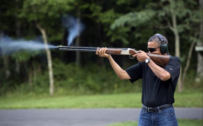 President Barack Obama shoots clay targets on the range at Camp David on Aug. 4, 2012. Photo: AP/White House