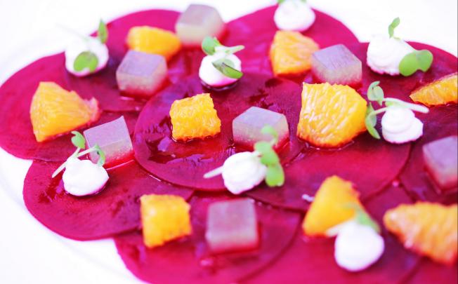 Beetroot carpaccio with goat's cheese and a citrus and mint glaze