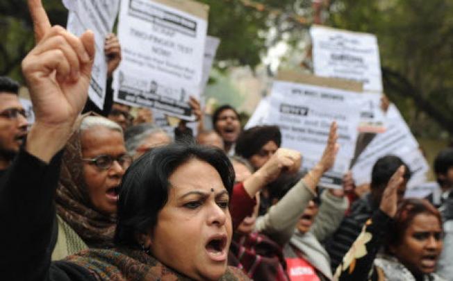 Indian activists shout slogans during a protest for the implementation of harsher punishments for rape cases in New Delhi. Photo: AFP