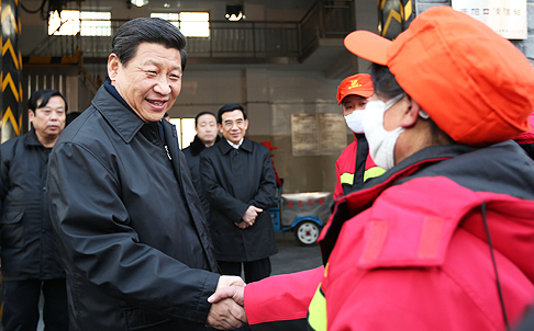 Chinese leader Xi Jinping meets with sanitation workers in Beijing on Friday. Photo: Xinhua