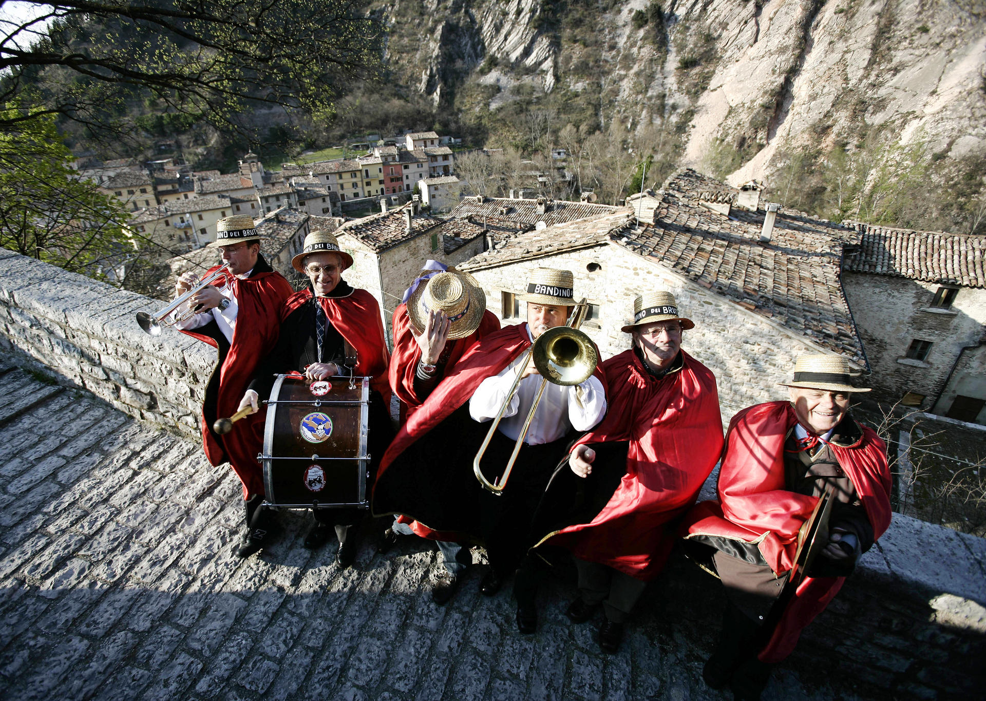 Members of the "ugly person's band" strike a chord in Piobbico, Italy. Photos: Reuters