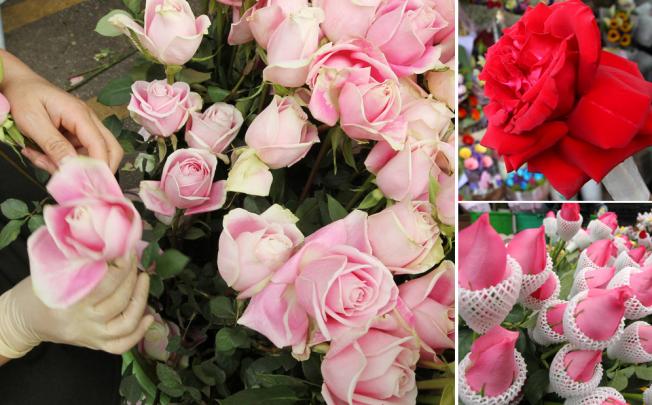 Mong Kok flower market is blooming in preparation for Valentine's Day tomorrow. What retailers are lamenting is a shortage of ardent suitors. Photos: Felix Wong