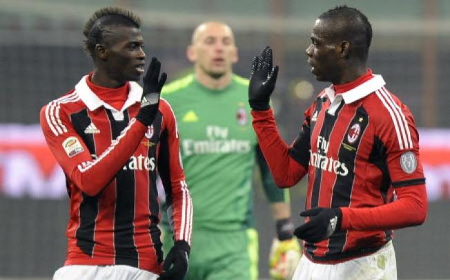 AC Milan's Mario Balotelli (right) celebrates with teammate Niang during their Italian Serie A soccer match against Parma at the San Siro stadium in Milan. Photo: Reuters