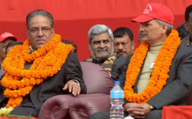 Chairman of Unified Communist Party of Nepal (Maoist), Pushpa Kamal Dahal known as Prachanda (left) and Nepalese Prime Minister Baburam Bhattarai (right). Photo: AFP