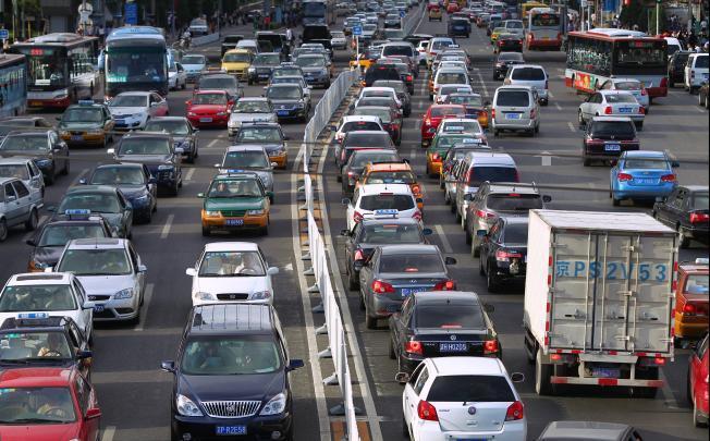 Red licence plates might a way to combat official car misuse, a Beijing primary student suggested. Picture: SCMP