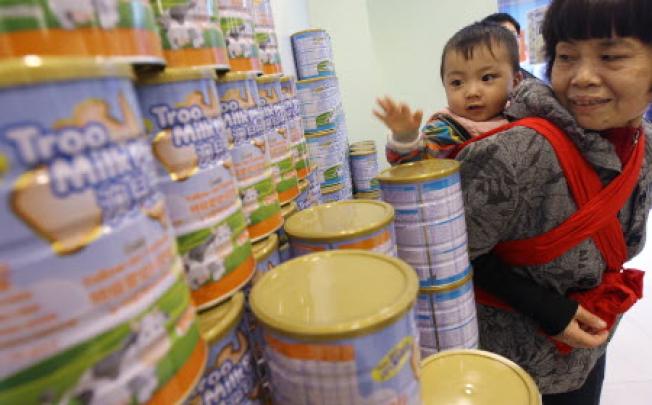 Two-can limit on milk powder will start on March 1. David Wong/SCMP