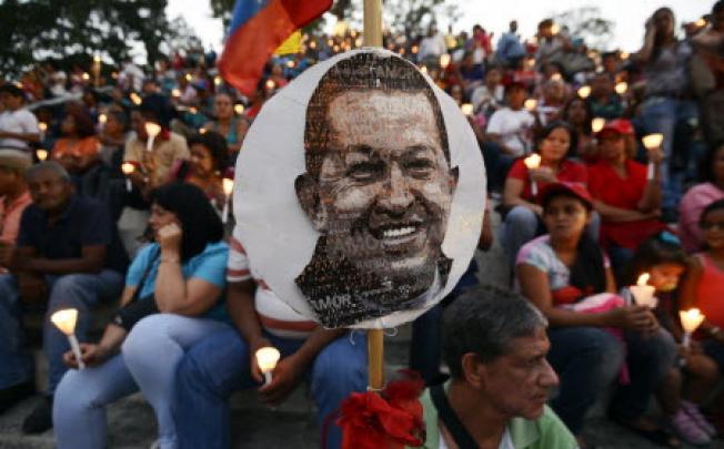 Supporters of Venezuelan President Hugo Chavez attend an open-air mass in Caracas. Photo: AFP