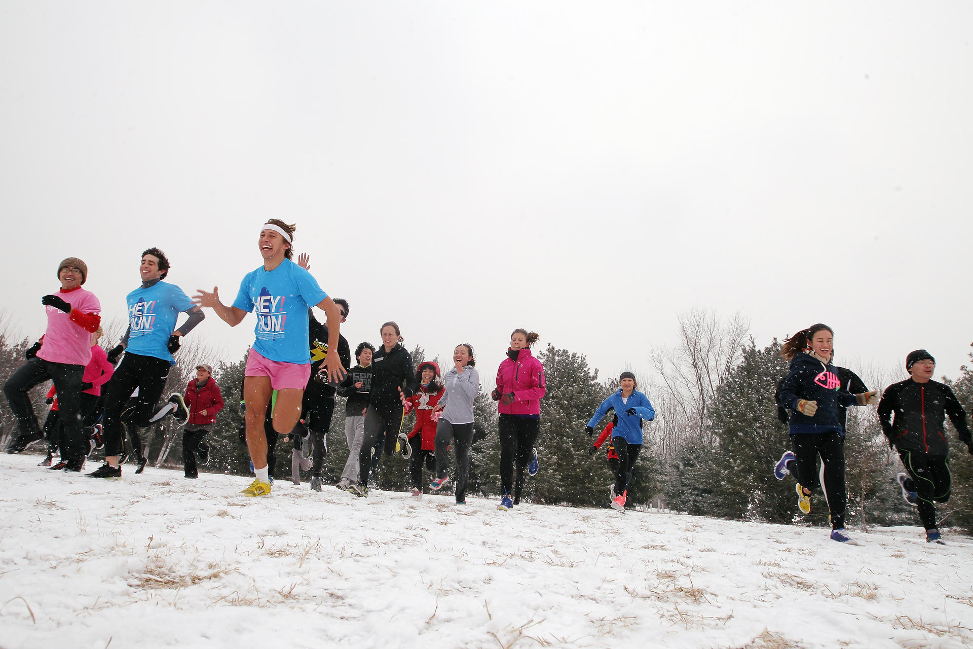 Linus Holmsater (in blue T-shirt and pink shorts) leads his followers in Heyrobics in the Olympic Forest Park in Beijing. Photo: Simon Song