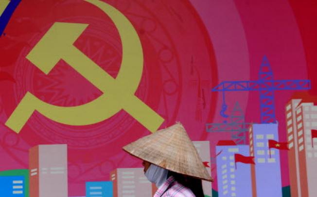 A poster marking the 83th anniversary of the foundation of Vietnamese Communist Party. Vietnam’s government says it will not tolerate criticism of one-party rule.  Photo: AP