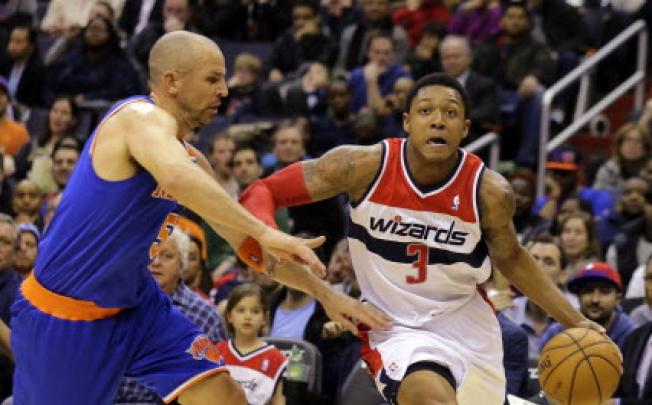 Washington Wizards guard Bradley Beal drives against New York Knicks guard Jason Kidd in their NBA basketball game. Photo: AP