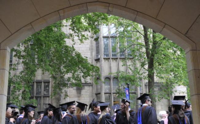 Future graduates wait for the procession to begin for commencement at Yale University in New Haven, Conn. U.S. Photo: AP