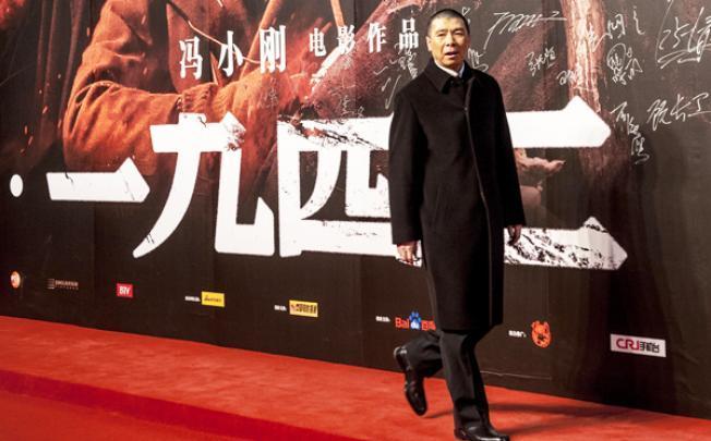 Director Feng Xiaogang at the premiere of his film '1942' in Beijing. Photo: Xinhua