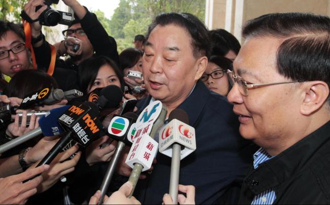 Qiao Xiaoyang, chairman of the Law Committee under the National People's Congress Standing Committee, speaks to reporters at yesterday's NPC seminar in Shenzhen. Qiao insisted Beijing had shown maximum tolerance to the city's dissident parties. Photo: SCMP