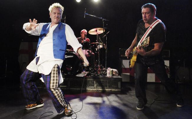 John Lydon, left, Paul Cook, rear, and Steve Jones of The Sex Pistols perform at the Roxy in West Hollywood, Calif., Thursday, Oct. 25, 2007. Photo: AP