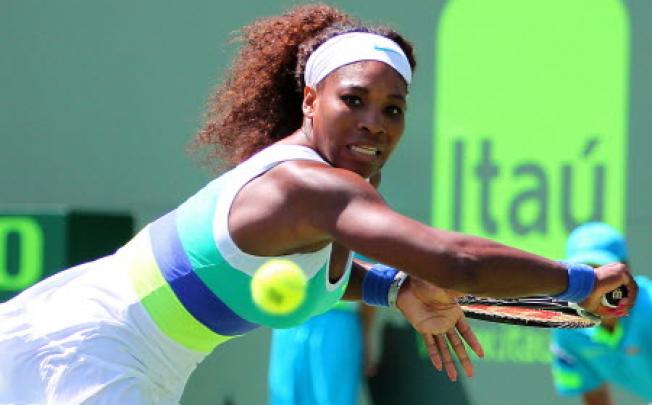 Serena Williams returns to Na Li of China during their match at the Sony Open tennis tournament at Crandon Park in Key Biscayne, Florida, on Tuesday. Photo: AP