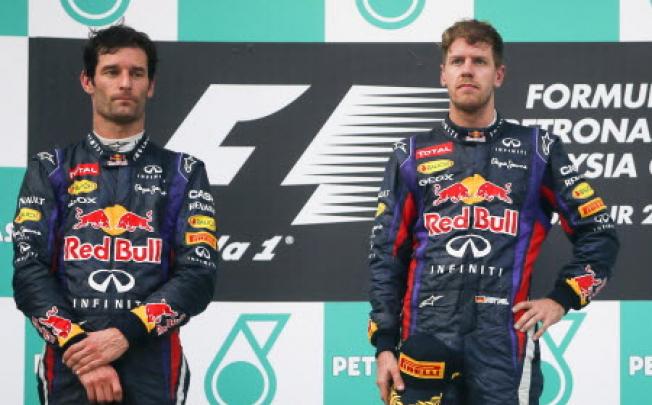 Australian Formula One driver Mark Webber (L) of Red Bull Racing and German teammate Formula One driver Sebastian Vettel. Photo: EPA