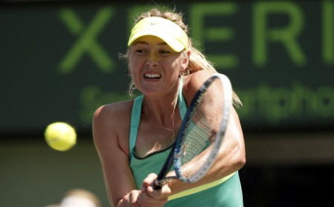 Maria Sharapova of Russia hits a backhand during her semi-final victory over Jankovic of Serbia at the Sony Open tennis tournament in Key Biscayne. Photo: Reuters