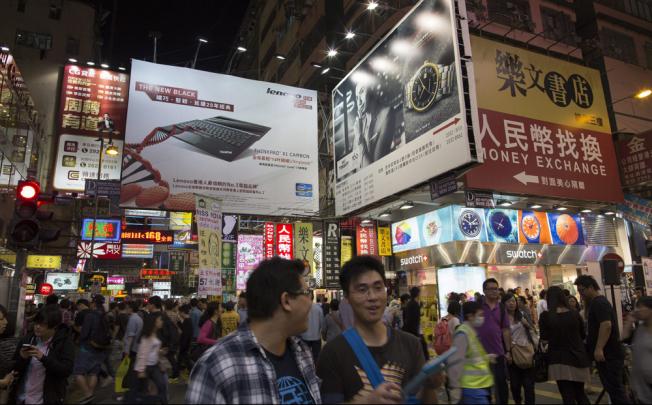 Giant illuminated billboards and electric signboards in Hong Kong. Photo: EPA