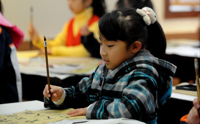Educating and equipping children to face the future with confidence is the aim of every parent. Photo: Xinhua