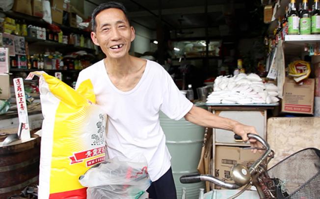 Wong Tak-kam says in the 1970s there were more rice shops in Hong Kong than banks. Photo: SCMP